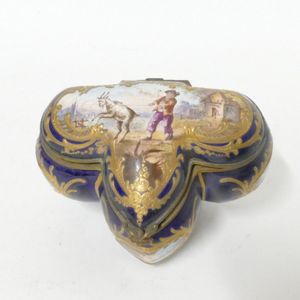 A 19th century Sevres lidded trinket box, the stylised…