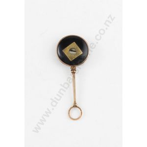 An interesting Victorian gold plated magnifier, of lorgnette…
