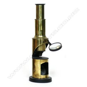 A 19th century brass drum microscope, with cut away tubular…