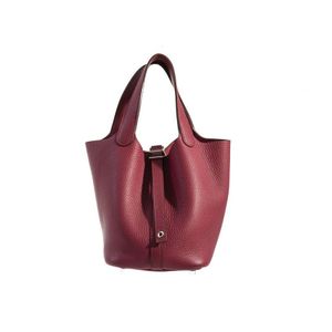 raspberry leather handbag