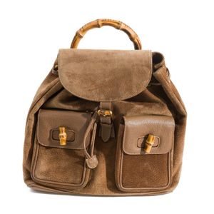 A bamboo backpack by Gucci, styled in brown suede with brown&hellip;