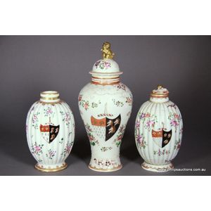 Two porcelain tea caddies and a covered vase by Samson. Late…