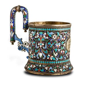 A Russian enamel and silver gilt tea glass holder, first half…