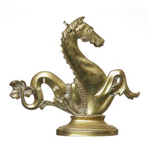 A Victorian brass doorstop, modelled in the form of a mythical…