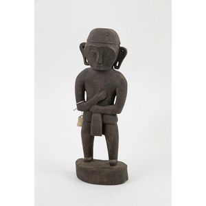Nias Island figure of ancestral form with crossed arms on base,…