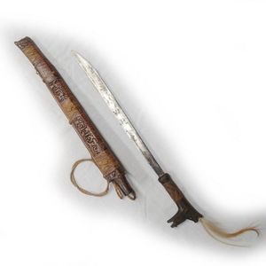 A Dayak Mandau (head hunters) sword, the hard wood hilt with&hellip;