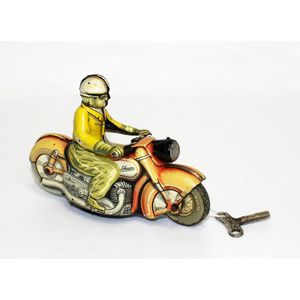 Schuco 'Carl', tinplate motorbike and civilian rider with…