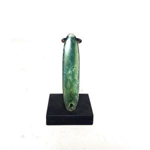 A greenstone Maori ear pendant, New Zealand, 19th century,…