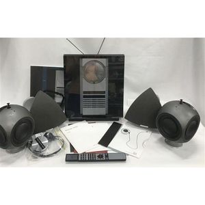 A Bang & Olufsen BESound 3200 sound system, with a Beo4 remote…