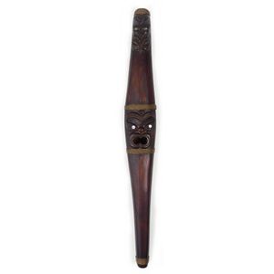 A mid-late 20th century Maori carved putorino (bugle flute)…