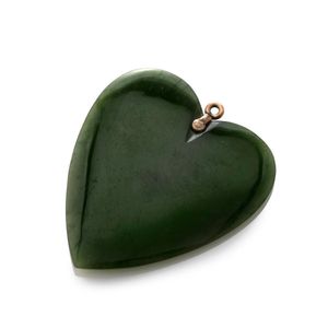 An antique New Zealand greenstone heart-shaped pendant with…