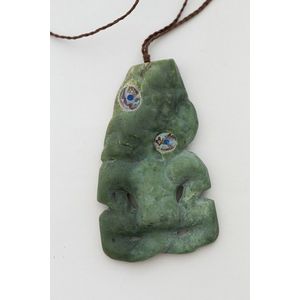 20th century greenstone tiki paua inset eyes, 9.5 cm length,…
