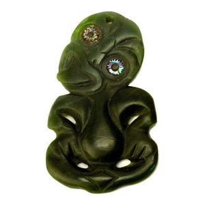 A 20th century Maori greenstone hei tiki, of good proportion…