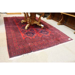 Bokhara rug, hand knotted wool, Hooked medallion field on a red…