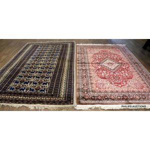 Two Persian rugs, 20th century, comprising a Persian silk on…