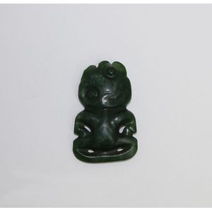 Pounamu hei-tiki, kawakawa variety with hands to thighs and…
