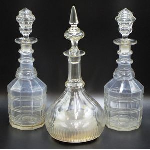 Three Victorian cut glass decanters including a musical one,…