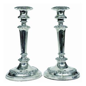 A pair of mid-19th century Sheffield Plate candlesticks, the…