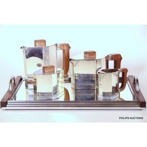 An Art Deco silver plated four piece coffee service, and a tray,…