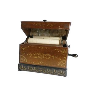 A rare American 'Melodia' portable paper-roll driven organ by…