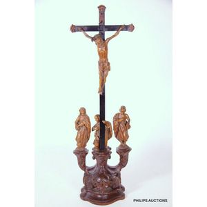 A finely carved crucifix in mixed timbers, 18th century, French…