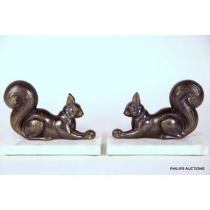 A pair of Art Deco spelter squirrel book ends, circa 1920s, an…