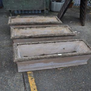 Three composite stone garden troughs, each approx 42 cm high,…