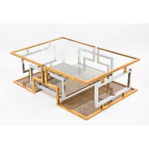 A brass and chrome geometric design occasional table by Maison…