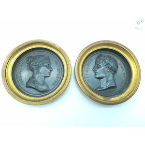 Bronze circular medallions, a pair depicting Napoleon and…