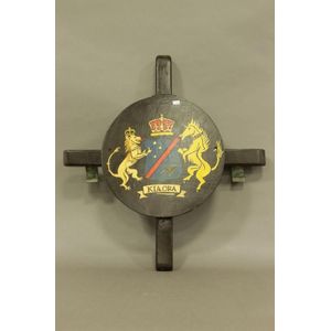 A painted wooden ship's life preserver stand for 'Kia Ora' with…