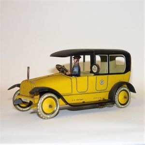 An uncommon c.1920 Lehmann #755 tinplate yellow cab taxi,…