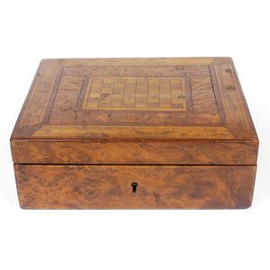 A colonial N.Z. woods inlaid trinket box, the top with a…