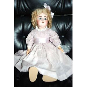 A DEP porcelain headed sleeping eye doll, four teeth upper,…