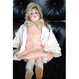 A DEP porcelain headed sleeping eye doll, four teeth upper,…