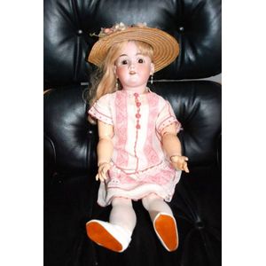 A DEP porcelain headed sleeping eye doll, four teeth upper,…