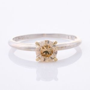 18ct white gold, modern diamond ring, featuring one claw set&hellip;