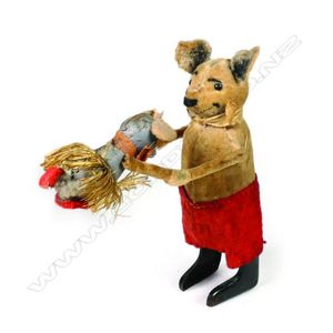 A vintage Schuco clockwork toy, the rat playing with a baby rat,…