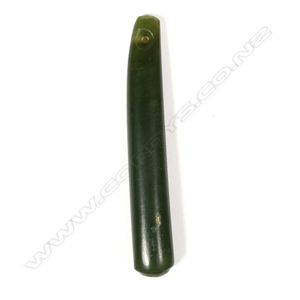 An old Maori carved pounamu pendant, tapered form, oval…