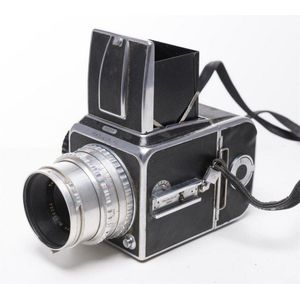 A Hasselblad 1000F, in leather case with Zeiss Opton lens, no…