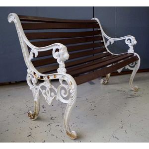 Cast iron & timber slat outdoor settee with lion mask…