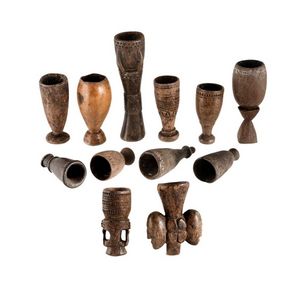 12 various betel nut mortars, Pacific region. Height 22.5 cm,…