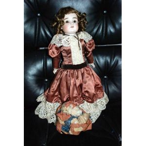 A DEP porcelain headed sleeping eye doll, four teeth upper, kid…