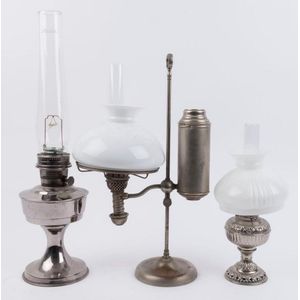 Three nickel plated kerosene lamps, early 20th century, the…