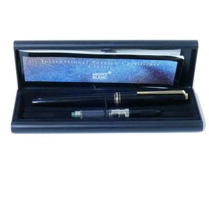 A Mont Blanc 210 fountain pen in black resin with gold trim,…
