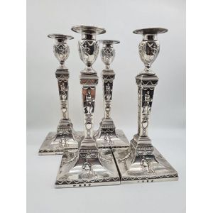 Georgian silver candlesticks, a rare suite of four sterling…