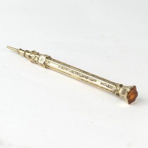 A Victorian 9ct. gold propelling pencil, the exterior profusely…