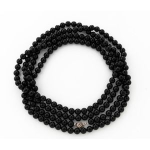 Tiffany & Co onyx beads, The opera length strand of uniform…