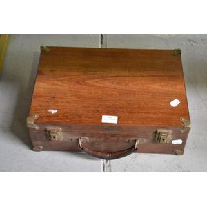 Vintage cedar suitcase with metal mounts and leather handle,…
