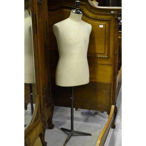 At Auction: AN EARLY 20TH CENTURY DRESSMAKERS MANNEQUIN on an ebonised  tripod base. 135 cm x 30cm.