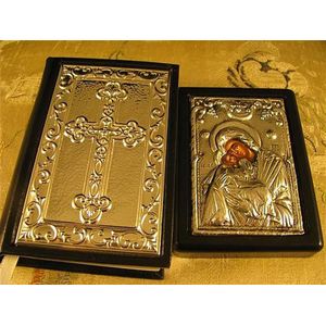 A Greek Orthodox bible and icon and a tapestry cushion